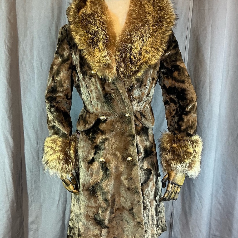 Stunning coat with Raccoon Fur accents
